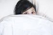 Insomnia female is trying to get some sleep