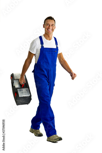 Foto: Handwerker mit Werkzeugkoffer Handwerker mit Werkzeugkoffer
