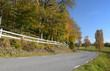 Road's turn in autumn colors