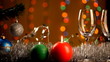 Two glasses of wine over Chrismas decorations background