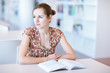 female college student in a library