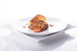 Yorkshite pudding and stew on white plate