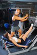 man and a woman in the gym