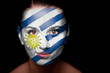Portrait of a woman with the flag of the Uruguay