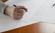 Hand and blueprint