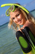Smiling woman wearing snorkeling outfit