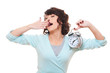 woman holding alarm clock and yawning woman holding alarm clock and yawning