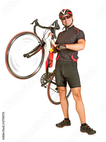 Photo: Man holding bicycle Man holding bicycle