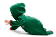 Baby in elf-costume on a white background