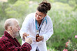 Foto: senior man with doctor or nurse senior man with doctor or nurse