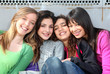 mixed race group of smiling girls