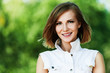 Photo: portrait young charming short-haired woman portrait young charming short-haired woman