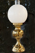 antique oil lamp isolated on texture background