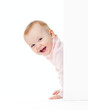 funny smiling girl look out of wall funny smiling girl look out of wall