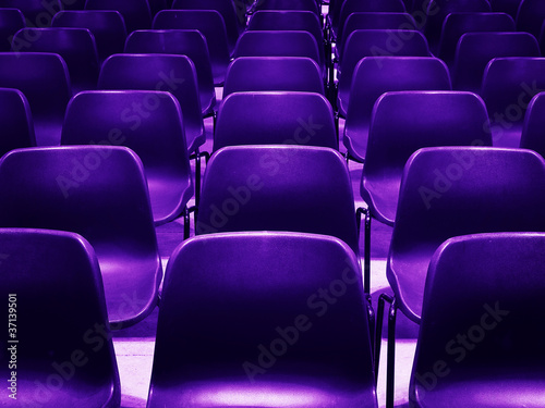 Photo: empty purple chairs empty purple chairs