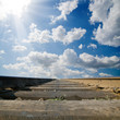 railroad under dramatic sky