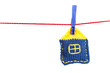 knitted house on a red string