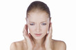A young woman with a ear ache