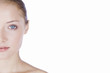Portrait of a young woman showing the left half of her face