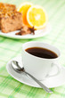Foto: A cup of coffee or tea and gingerbread on the background A cup of coffee or tea and gingerbread on the background