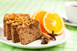 Foto: Gingerbread with orange and cup of coffee or tea. Gingerbread with orange and cup of coffee or tea.