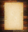 Old paper on the wood background