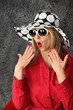 Shocked woman wearing hat