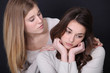 Woman consoling her friend