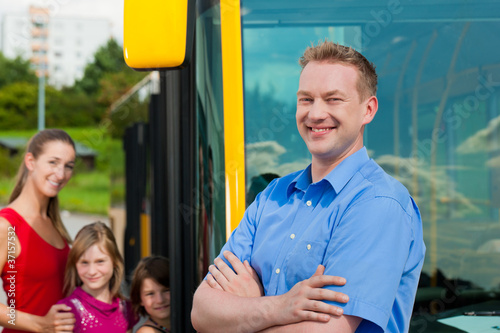 Photo: Passengers boarding a bus Passengers boarding a bus