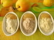 Schälchen mit Hirsebrei, Reisbrei und Dinkelbrei für Babys