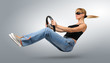 Young woman car driver in sunglasses with a wheel