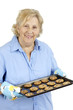 Senior woman with chocolate chip cookies Senior woman with chocolate chip cookies