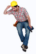 Scared tradesman spotting a spider