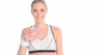 Exhausted Sportswoman Drinking Water from a glass