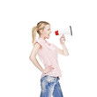 healthy young blonde attractive woman shouts in a bullhorn