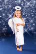 Photo: Christmas angel with a lot of sparkling stars Christmas angel with a lot of sparkling stars