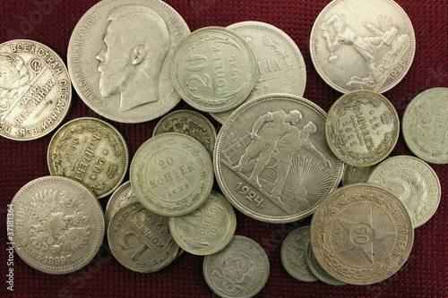 Photo: Silver antique coins close-up Silver antique coins close-up