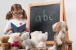 Little teacher - little girl playing school