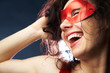 playful woman in carnival mask