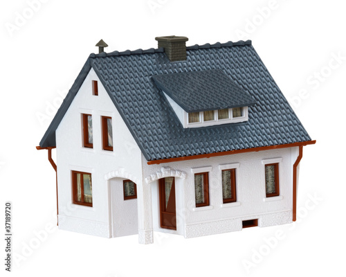 Photo: miniature house isolated on white background miniature house isolated on white background