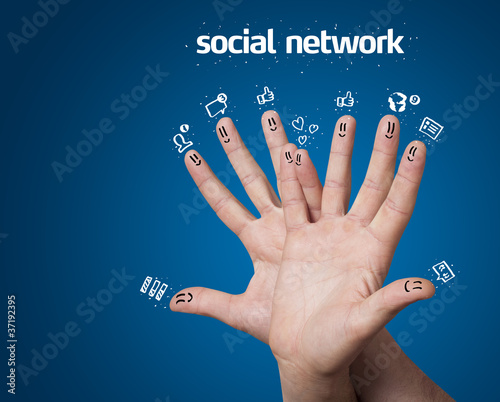 Photo: Happy group of finger smileys with social network sign and icons Happy group of finger smileys with social network sign and icons