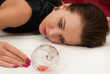 Poisoned  brunette lying on the floor