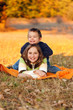 Kids playing outdoors in autumn