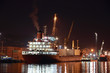 commercial ship in harbor at night commercial ship in harbor at night