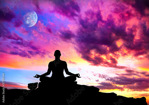 Photo: Yoga meditation silhouette pose Yoga meditation silhouette pose