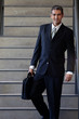Male Entrepreneur Walking Down Stairs