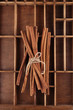 Cinnamon sticks on old wooden box Cinnamon sticks on old wooden box