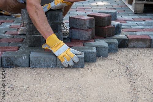 Photo: Pavers hands Pavers hands