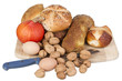 gem, nuts, eggs and a pumpkin on a wooden board