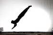 silhouette of gymnast on trampoline silhouette of gymnast on trampoline